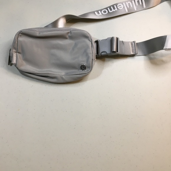 Lululemon Belt Bag NWT Color is Silver   It’s been stored in plastic - Picture 2 of 10